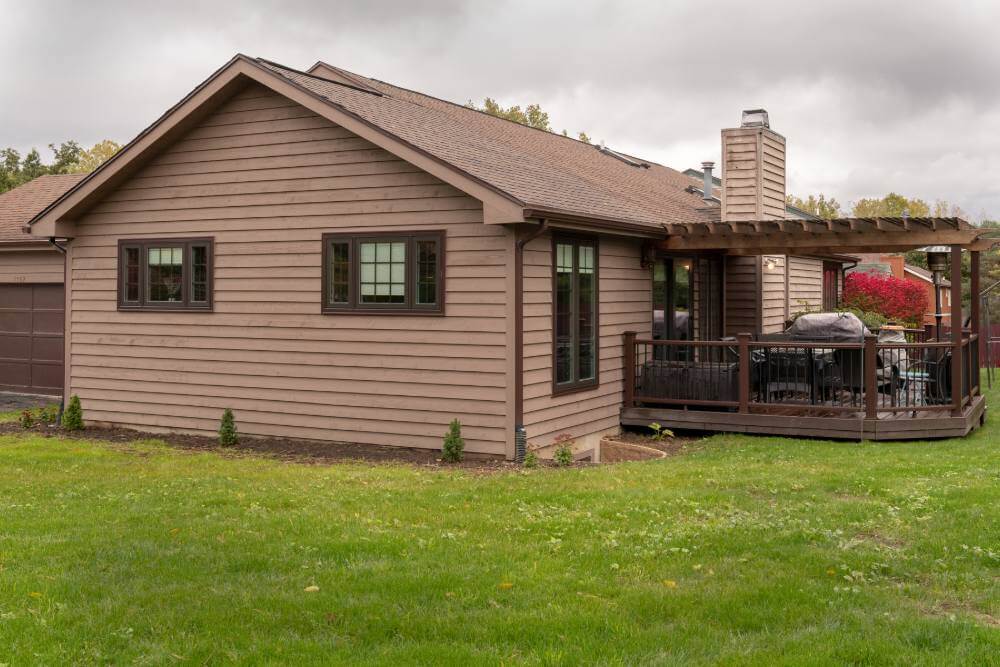 Rear exterior of East Lansing Michigan home after kitchen remodeling project by Odd Fellows Contracting