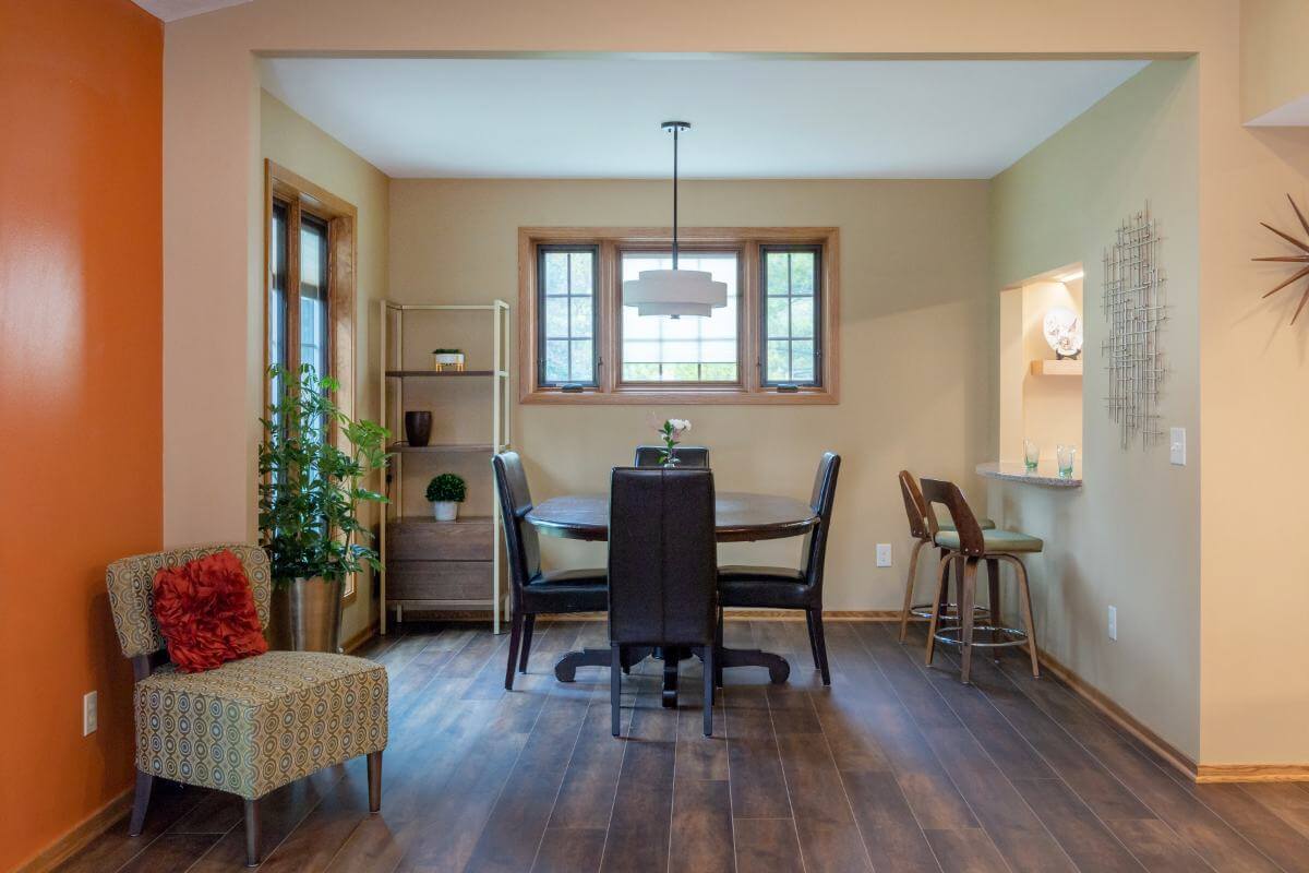 Remodeled dining room connected to kitchen renovation by Odd Fellows Contracting in East Lansing Michigan