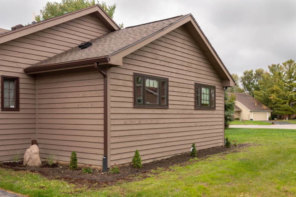 Updated home exterior during kitchen remodel project by Odd Fellows Contracting in East Lansing MI