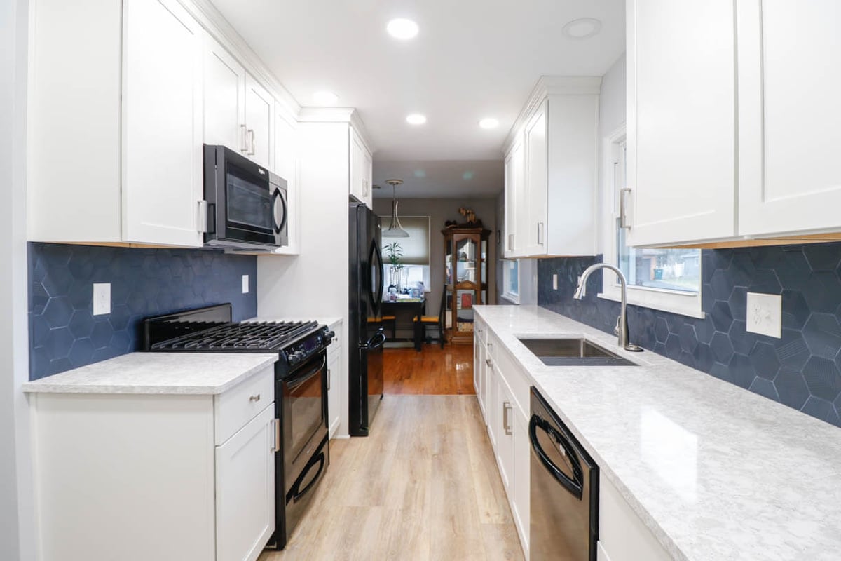 kitchen remodel detail in Cumberland Lansing, MI featuring modern sink and backsplash