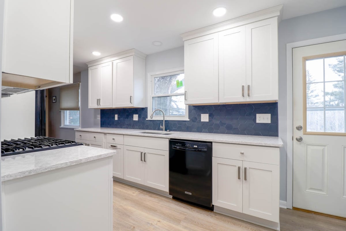 modern kitchen remodel by Odd Fellows Contracting in Cumberland Lansing, MI with custom cabinetry