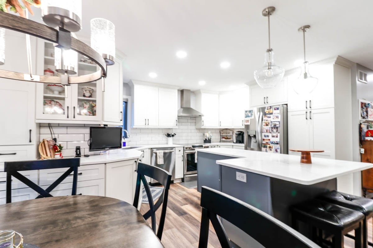 kitchen island detail from remodel by Odd Fellows Contracting in Walmar Estates, MI with quartz countertop and seating