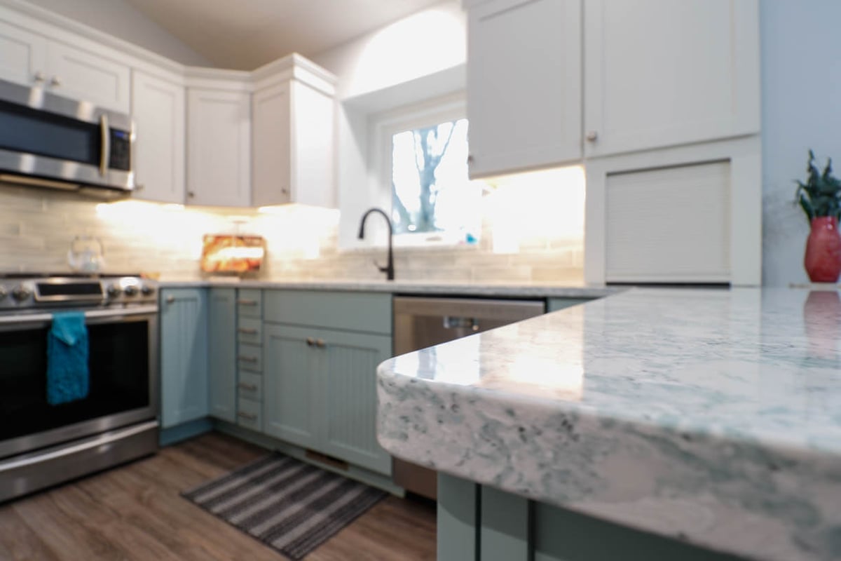 detailed view of quartz countertop edge from kitchen remodel by Odd Fellows Contracting in Williamston, MI
