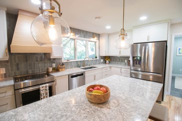 Warm, modern kitchen remodel by Odd Fellows Contracting in Greater Lansing, MI showing 2027 kitchen design trends