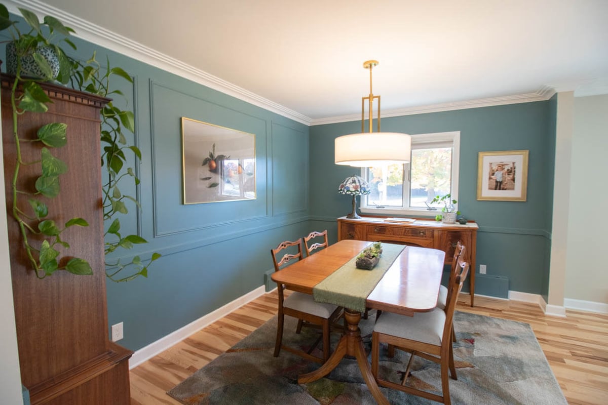 dining room renovation connected to kitchen remodel by Odd Fellows Contracting in Hiawatha Lakes, Okemos, MI with paneled accent walls