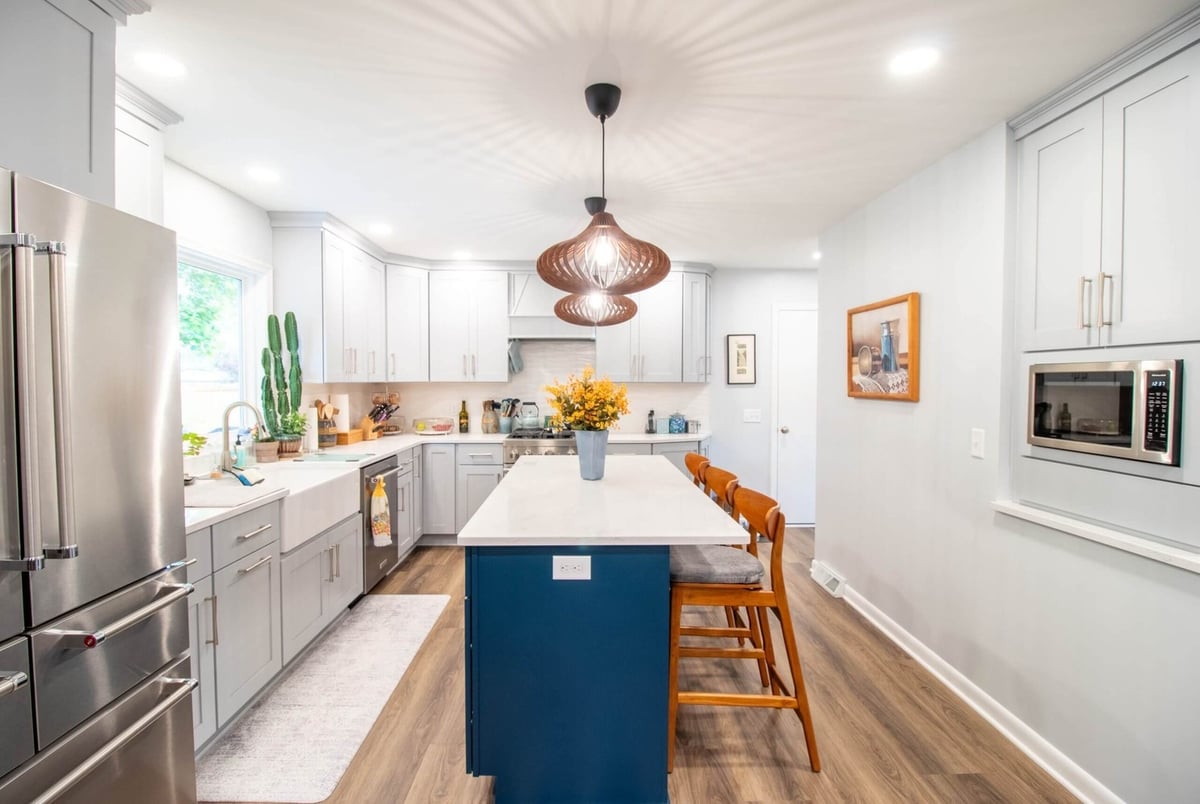 kitchen island with pendant lighting in Okemos, MI custom home by Odd Fellows Contracting