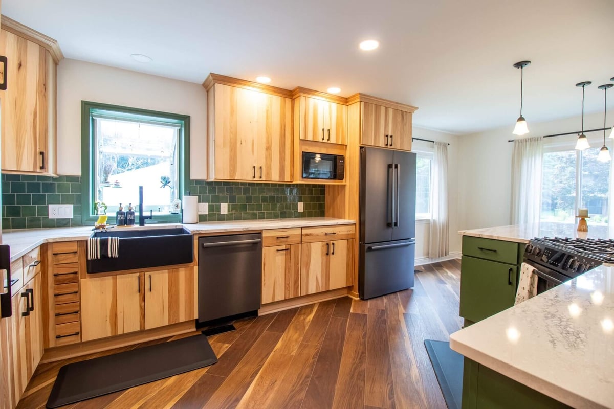 custom wood cabinetry and matte black fixtures in Okemos, MI by Odd Fellows Contracting