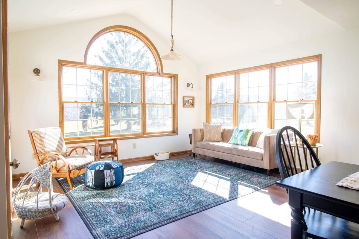 Holt Four Seasons, MI kitchen remodel by Odd Fellows Contracting showcasing dining area and natural light