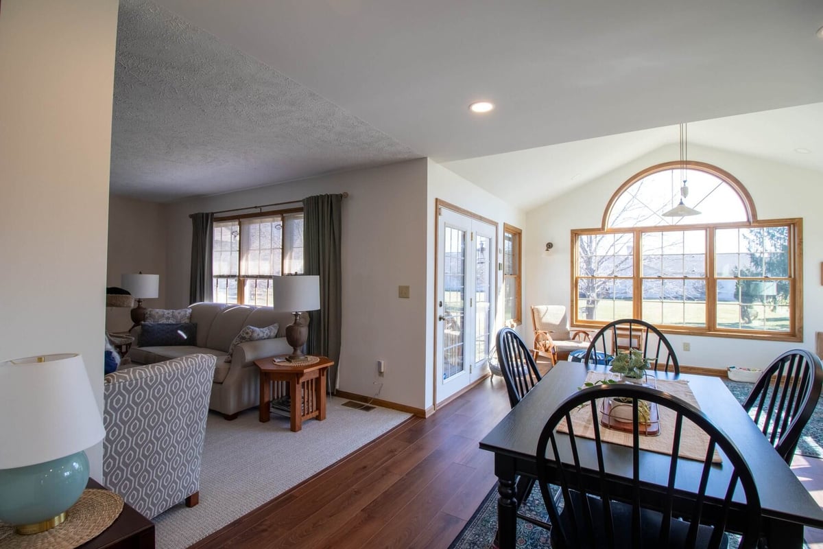 open concept kitchen and living area remodel by Odd Fellows Contracting in Holt Four Seasons, MI
