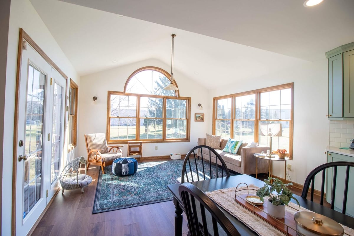 sunroom addition as part of kitchen remodel by Odd Fellows Contracting in Holt Four Seasons, MI