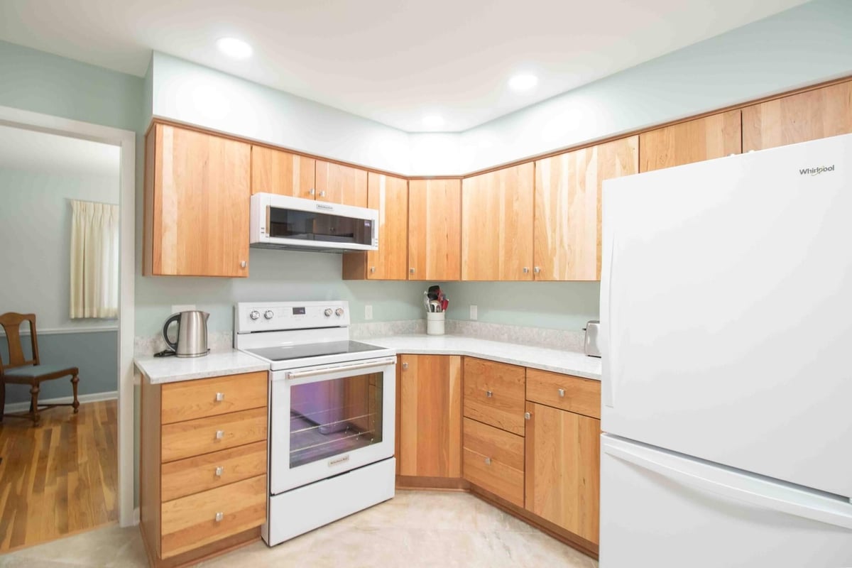 Lansing, MI kitchen renovation with updated appliances and cabinetry by Odd Fellows Contracting
