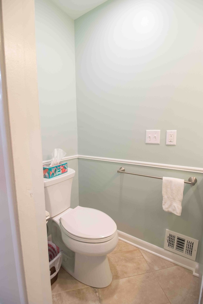Small bathroom renovation featuring new fixtures by Odd Fellows Contracting in Lansing, MI