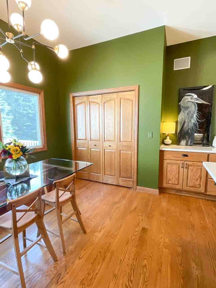 updated kitchen renovation with island seating and modern fixtures by Odd Fellows Contracting in Dewitt MI