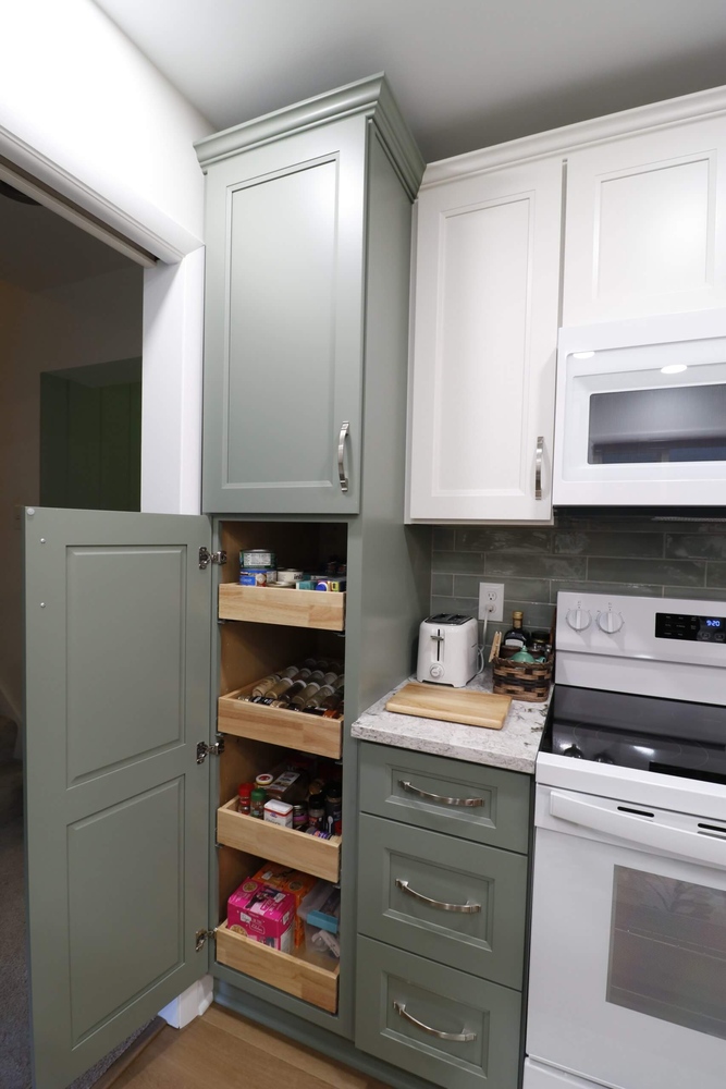remodeled kitchen storage solution in Tacoma Hills, MI by Odd Fellows Contracting