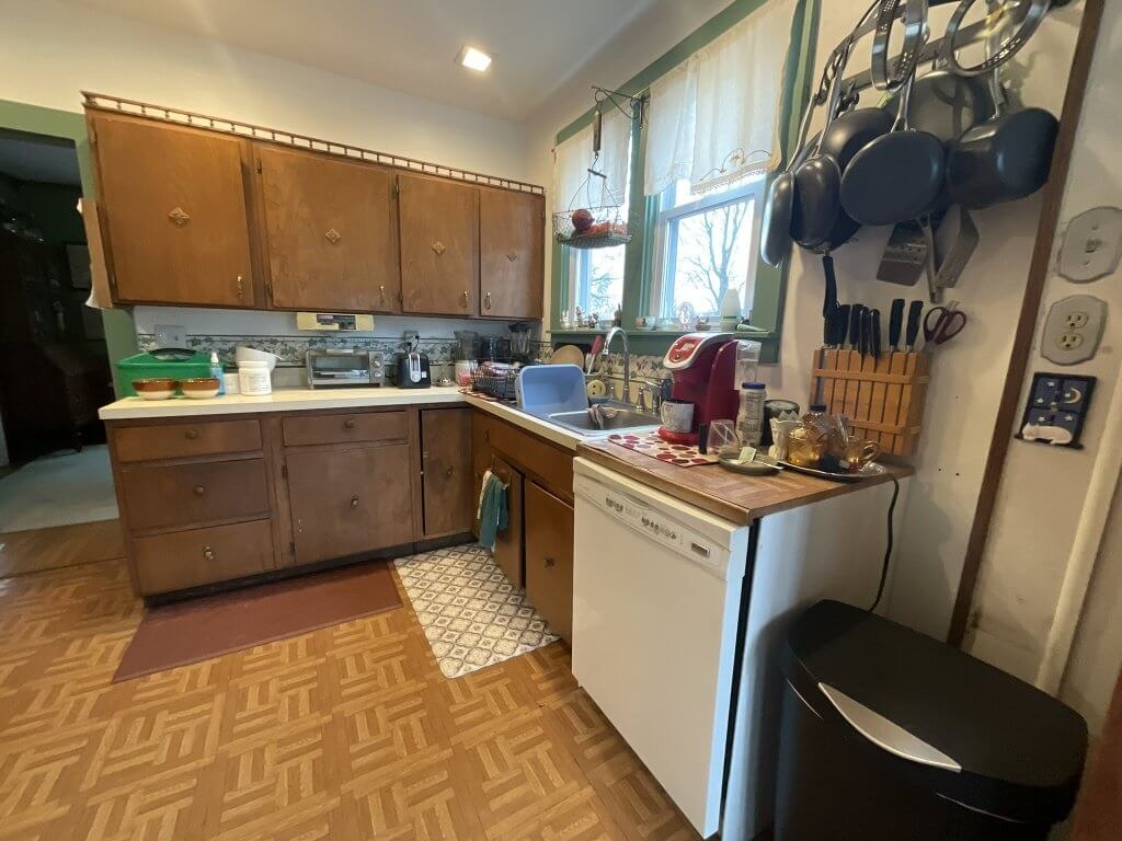 Pre-renovation kitchen space in Lansing Westside MI prior to remodel by Odd Fellows Contracting