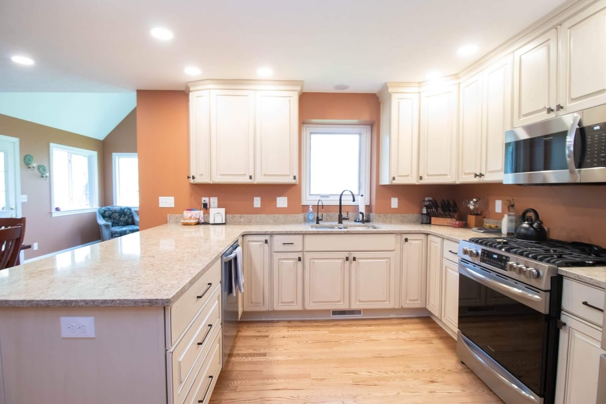 kitchen renovation featuring updated cabinetry, countertop, and appliances by Odd Fellows Contracting in Williamston MI
