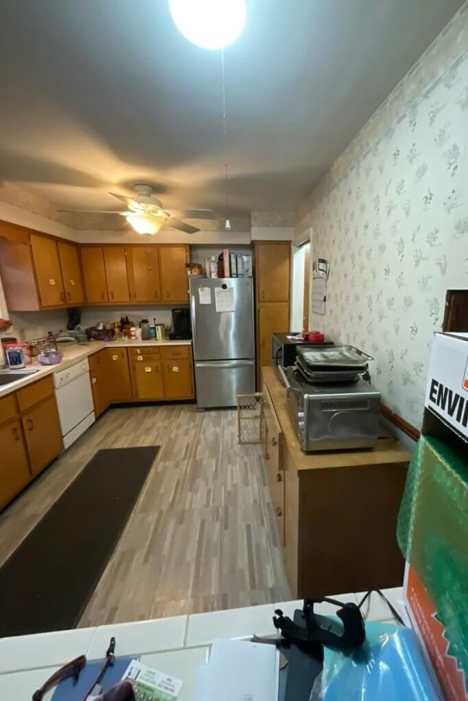 Pre-renovation kitchen in St. Joe, MI before cabinetry and countertop upgrade by Odd Fellows Contracting.