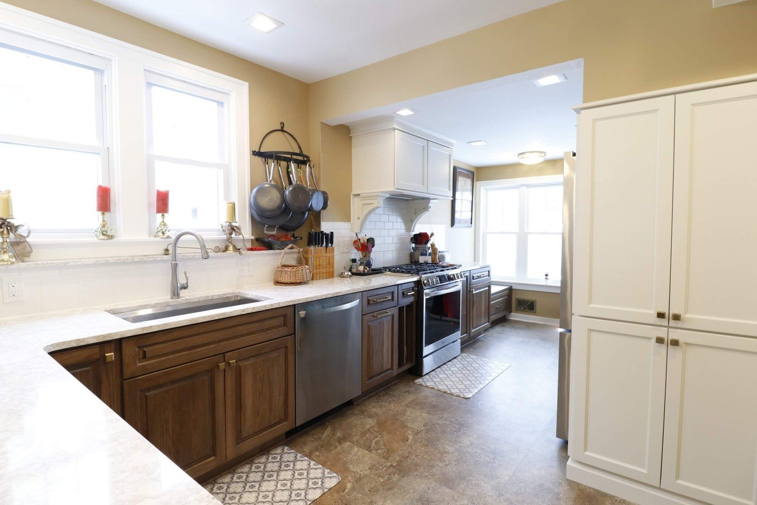 Lansing Westside MI kitchen remodel by Odd Fellows Contracting showcasing custom cabinetry and updated flooring