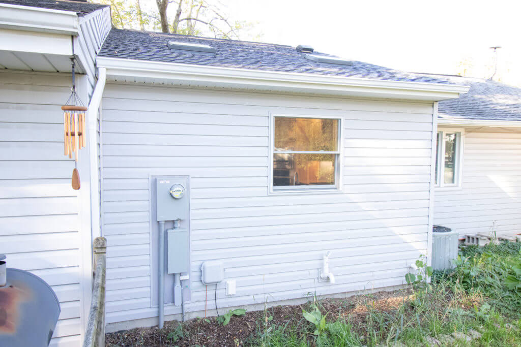 home exterior remodel with refreshed siding and exterior wall improvements by Odd Fellows Contracting in Grand Ledge, MI