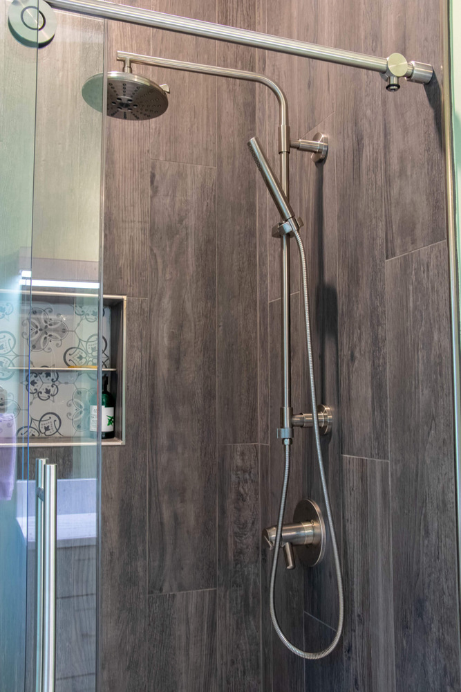bathroom remodel detail by Odd Fellows Contracting in Williamston MI featuring dual showerheads