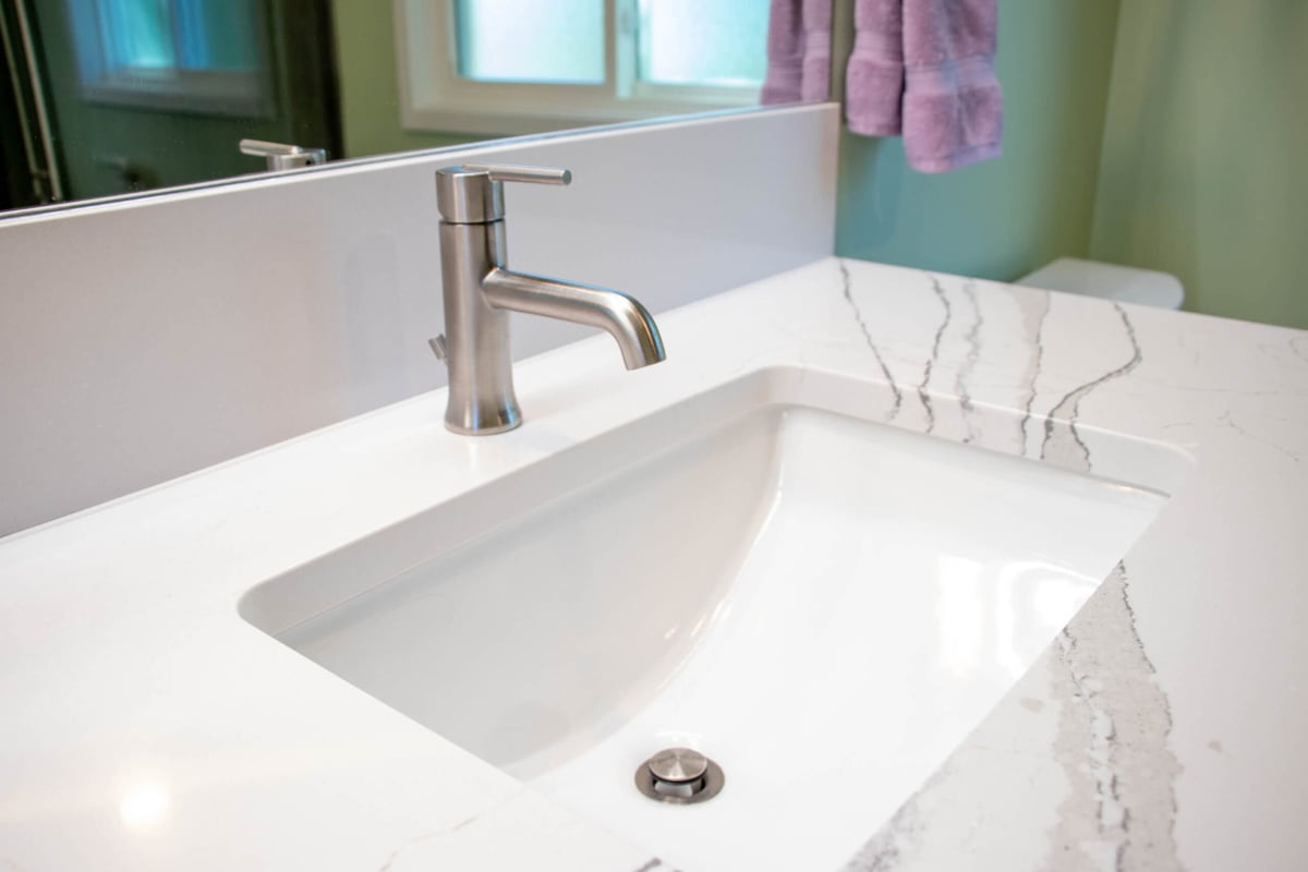 vanity countertop detail by Odd Fellows Contracting in Williamston MI with undermount sink