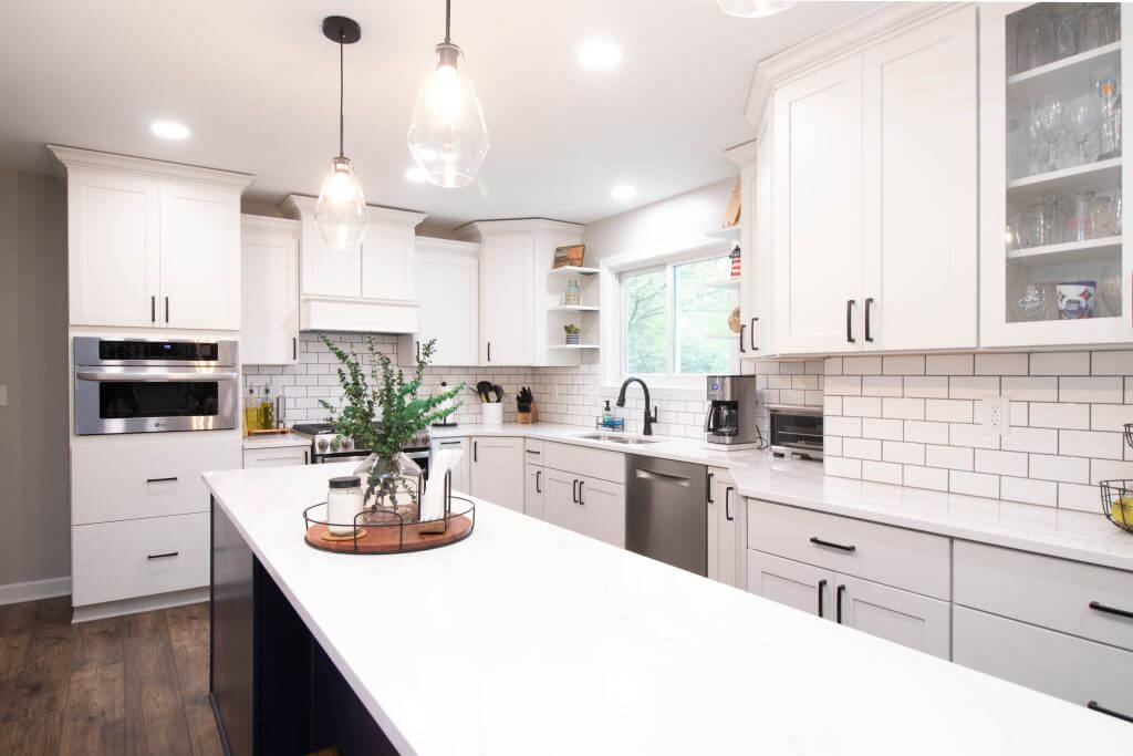 finished kitchen remodel with island countertop and updated cabinetry by Odd Fellows Contracting in Cumberland Lansing MI