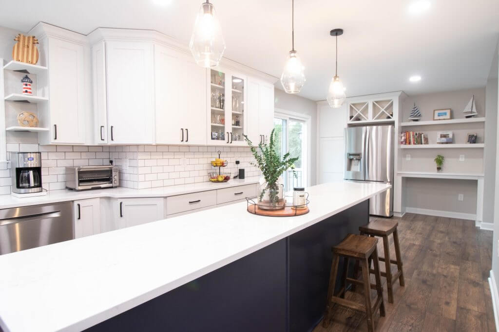kitchen renovation featuring open shelving and custom cabinetry by Odd Fellows Contracting in Cumberland Lansing MI