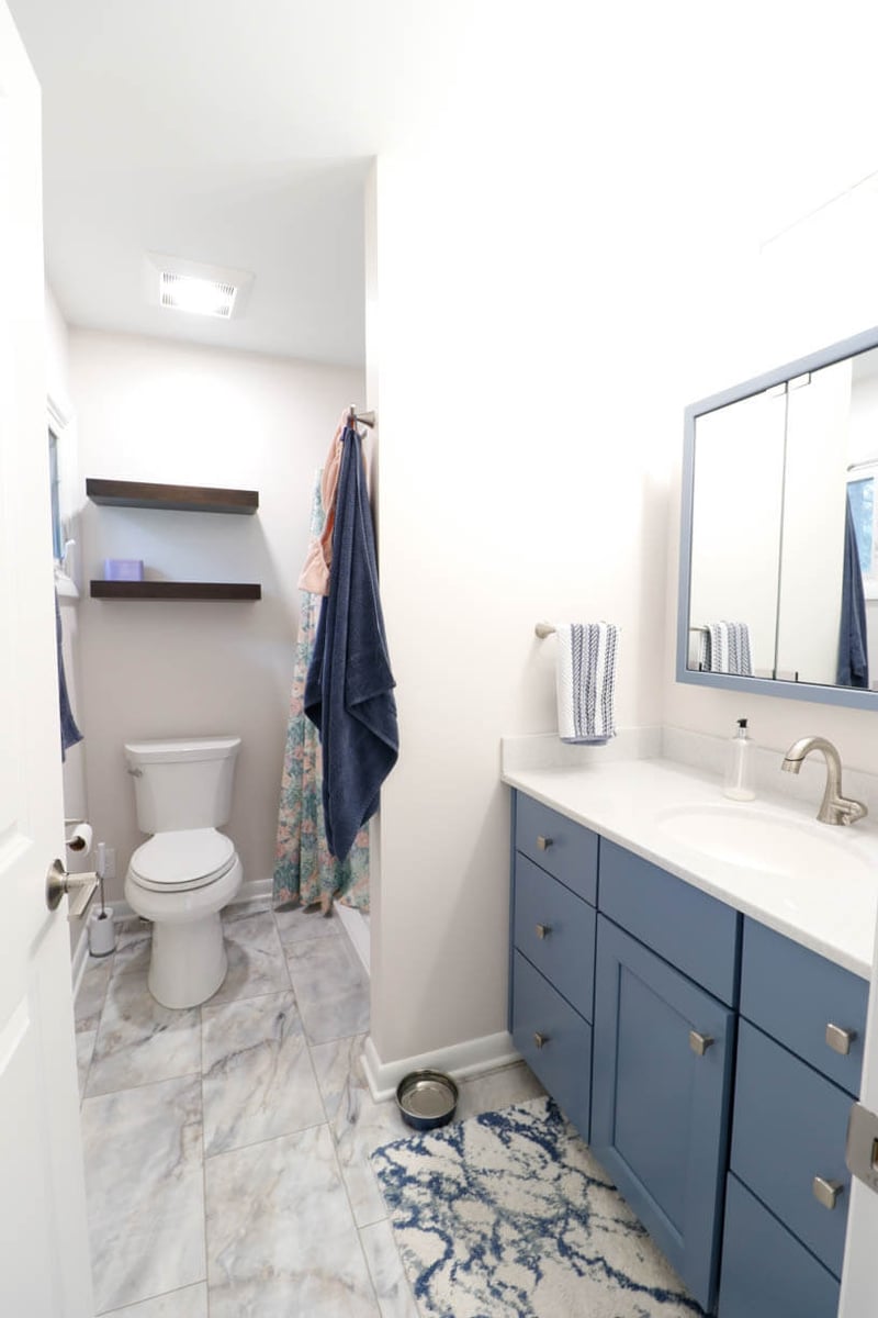 Cornell Okemos, MI custom home bathroom remodel by Odd Fellows Contracting with tub shower combination