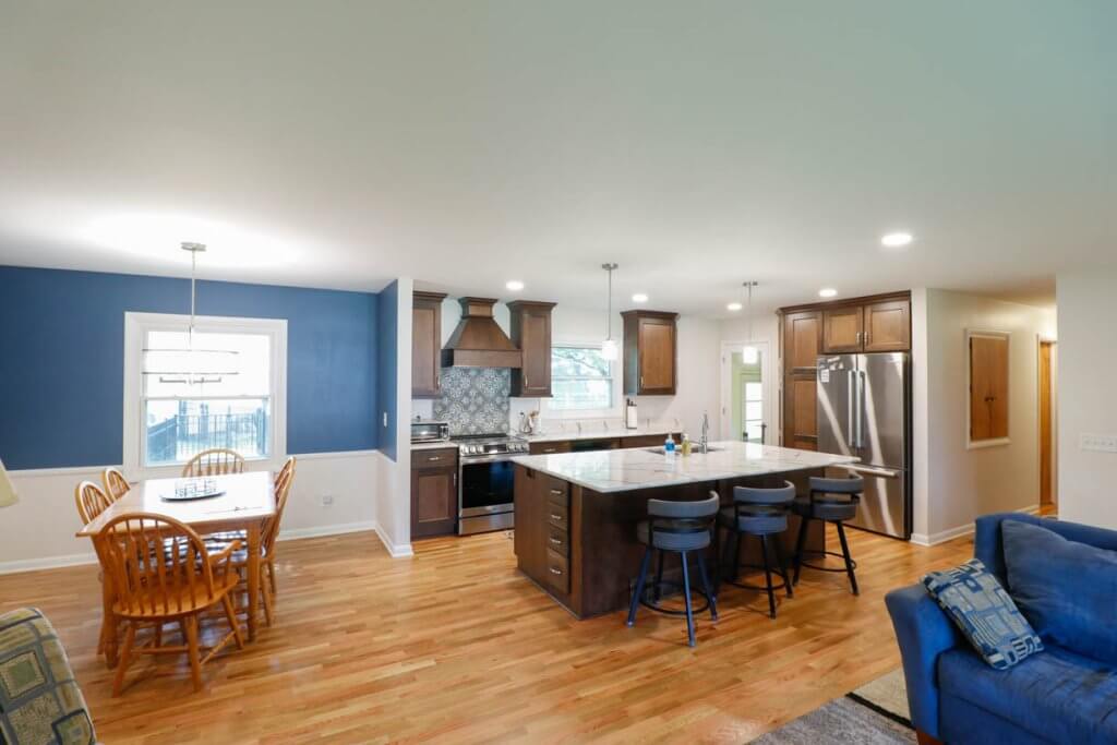 custom home kitchen layout by Odd Fellows Contracting in Cornell Okemos, MI with large island seating