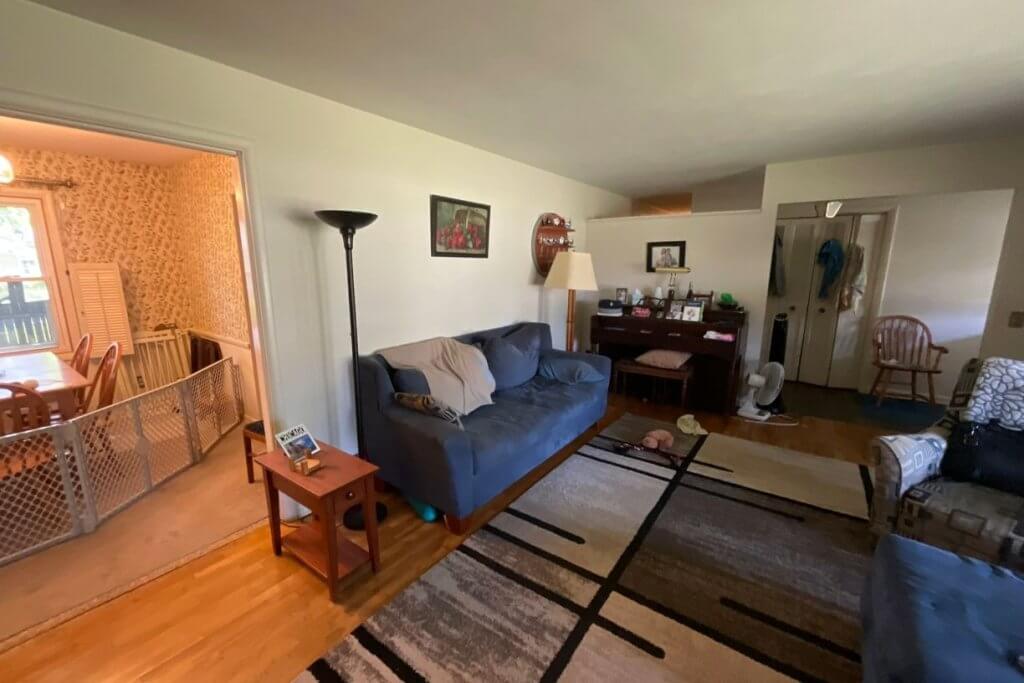 dated living area prior to remodel by Odd Fellows Contracting in Cornell Okemos, MI