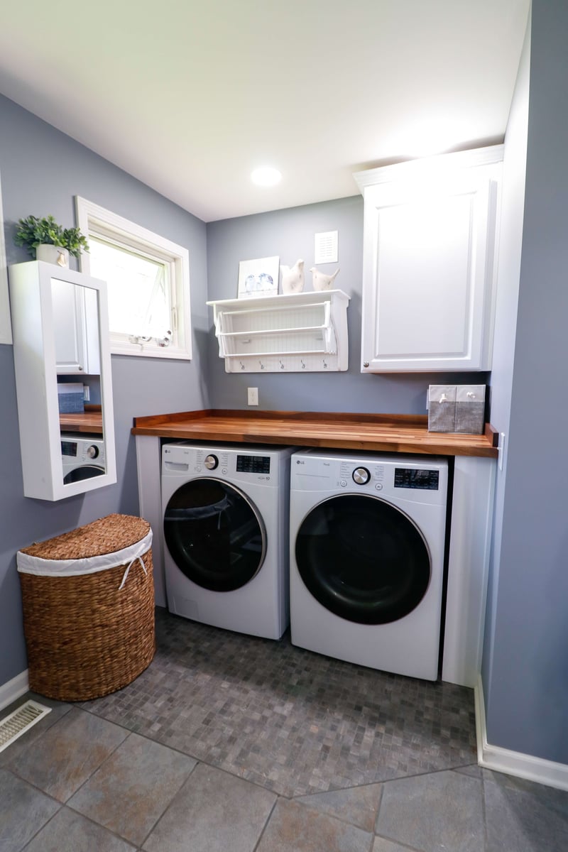 laundry remodel with wood countertop