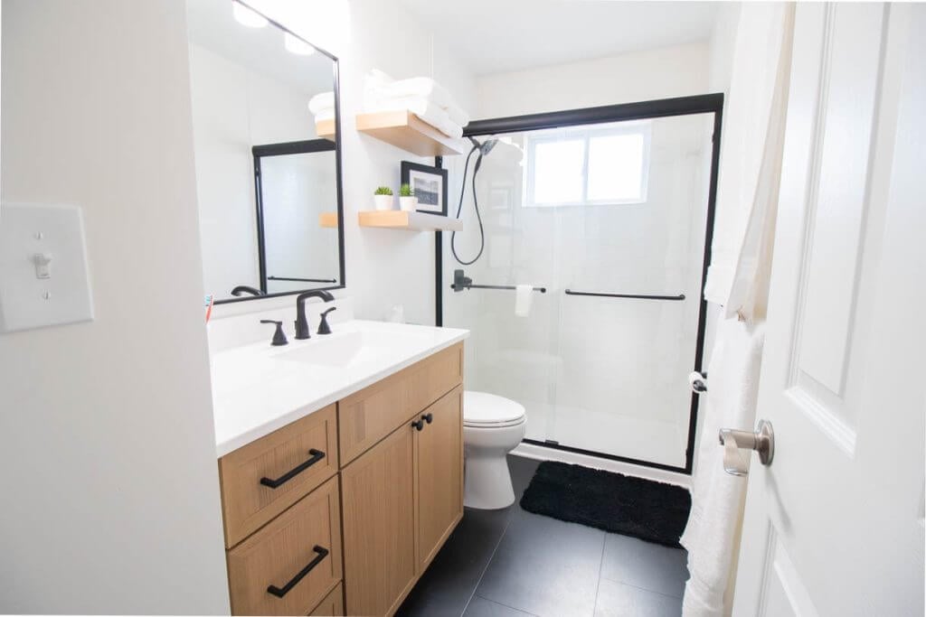 updated shower and vanity from Holt, MI bathroom renovation by Odd Fellows Contracting
